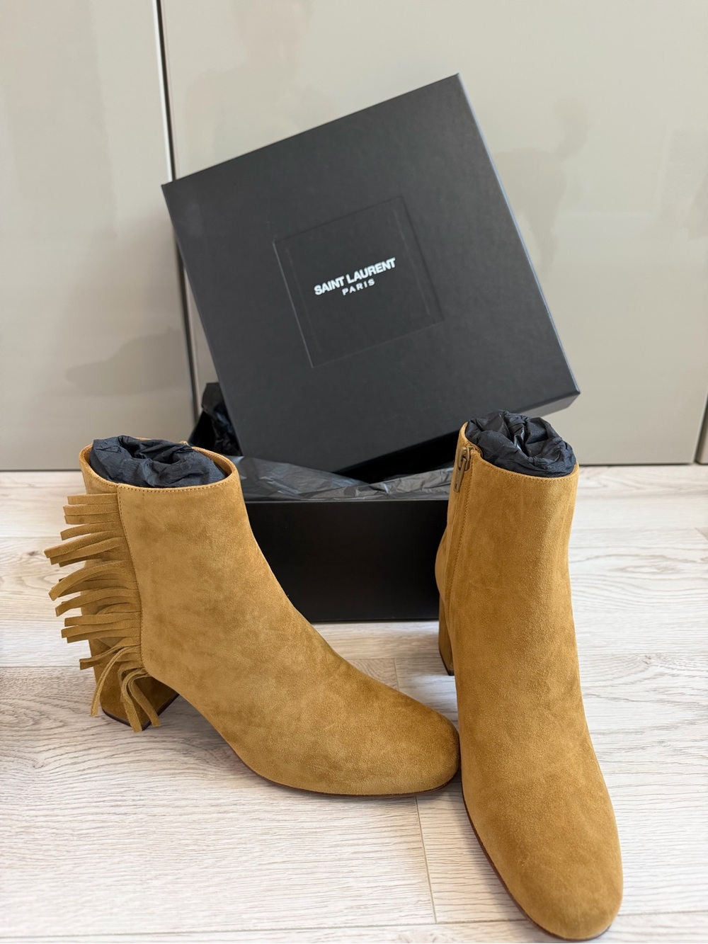 Saint Laurent Women’s Fringe Suede Ankle Boots in Camel